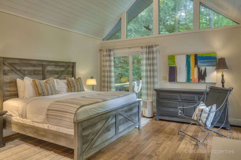 Spacious master bedroom with king size bed