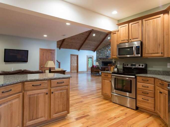 You can easily watch the TV while making meal preparations at the breakfast bar You can easily watch the TV while making meal preparations at the breakfast bar