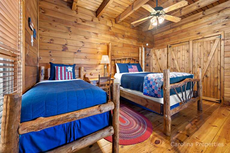 Main level bedroom 2 with queen and twin bed