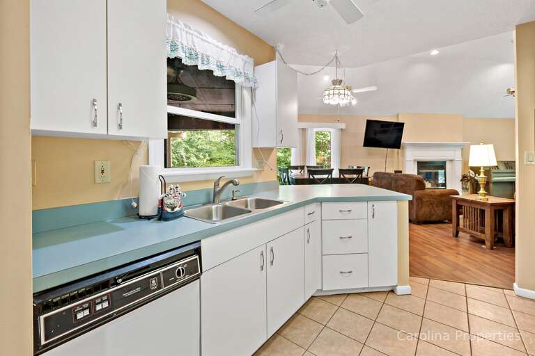 You can see the living room TV while you cook