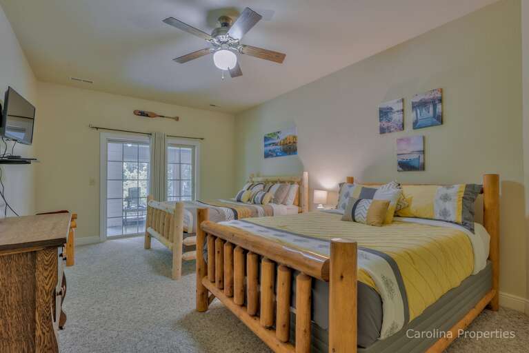 Lower level bedroom with two queen beds
