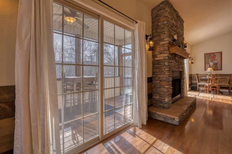 Walk directly from the kitchen to the enclosed porch