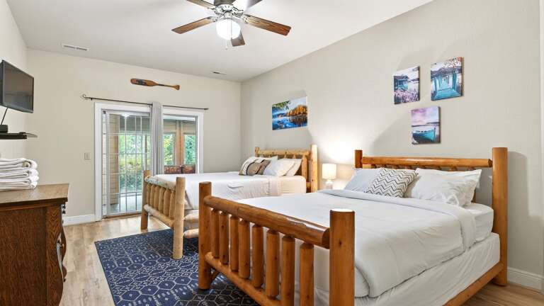 Lower level bedroom with two queen beds