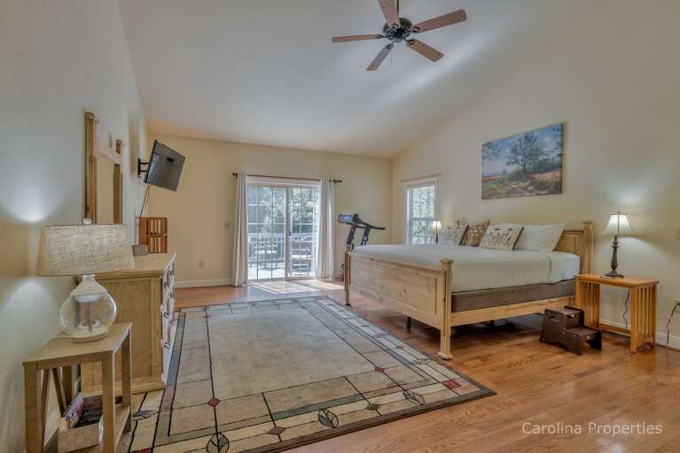 Main level master bedroom with king size bed