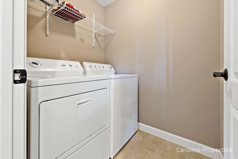 Laundry room with full sized washer and dryer Laundry room with full sized washer and dryer