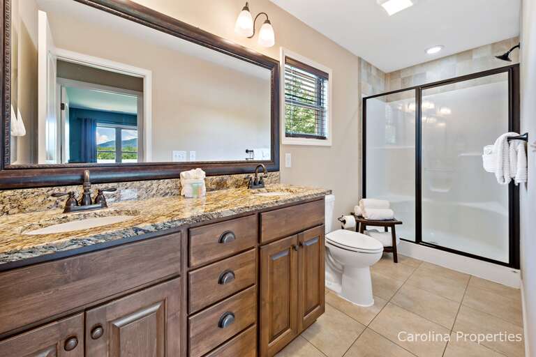 Bathroom with double sinks and walk in shower Bathroom with double sinks and walk in shower