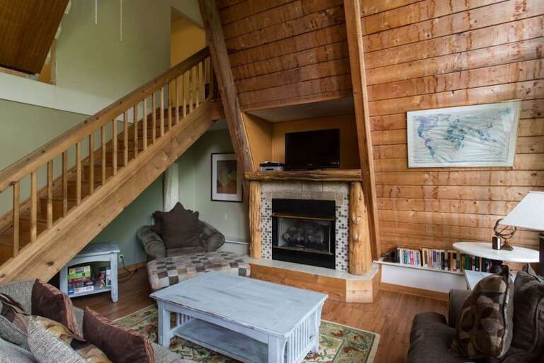 Head up the stairs for the second floor, third floor, and crow`s nest bedrooms.