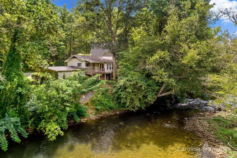 This relaxing property sits just above the river.