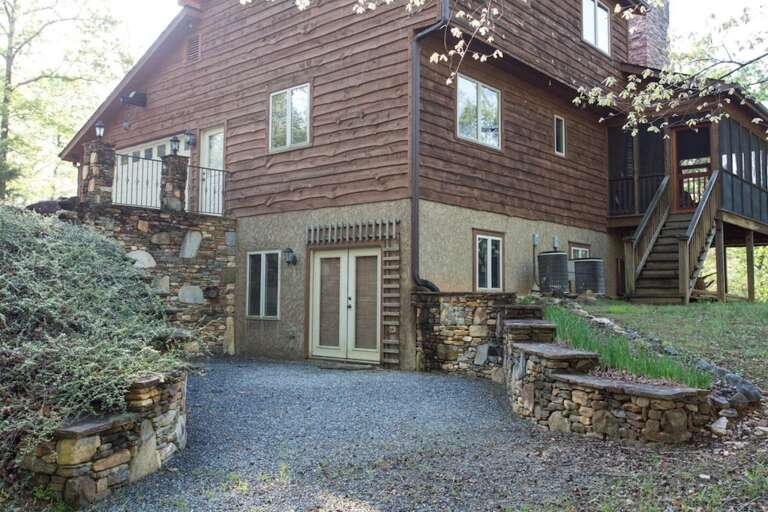 Looking at the back of the side and back of the home provide a better idea of its size.