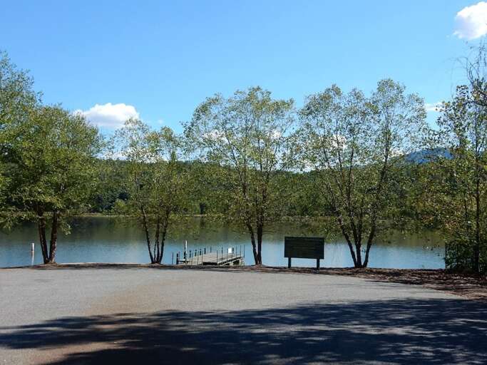 There is a deck on the lake. There is a deck on the lake.