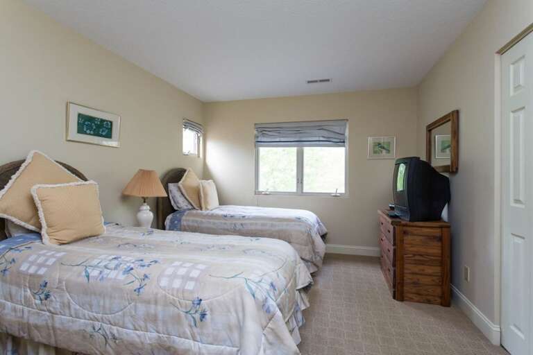 There is also a windows, bureau, and TV. There is also a windows, bureau, and TV.