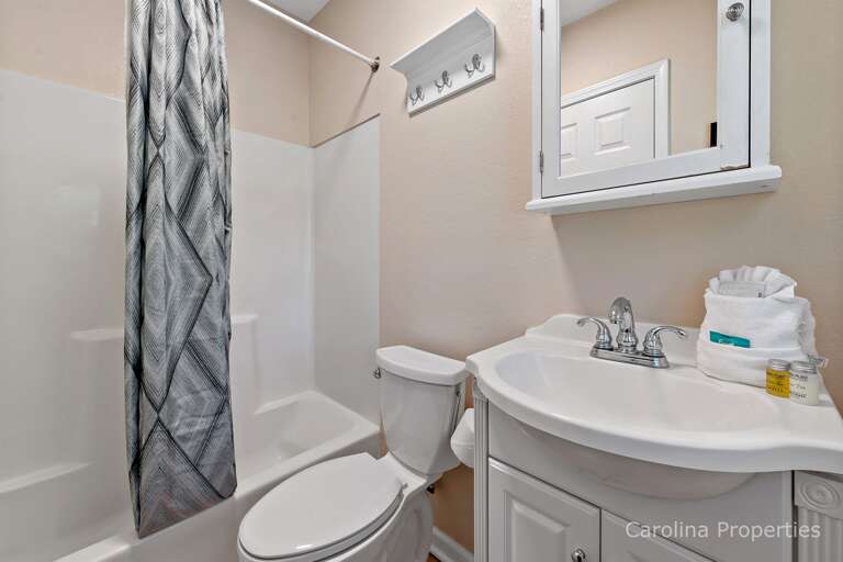 Upstairs bathroom with full bathtub and shower