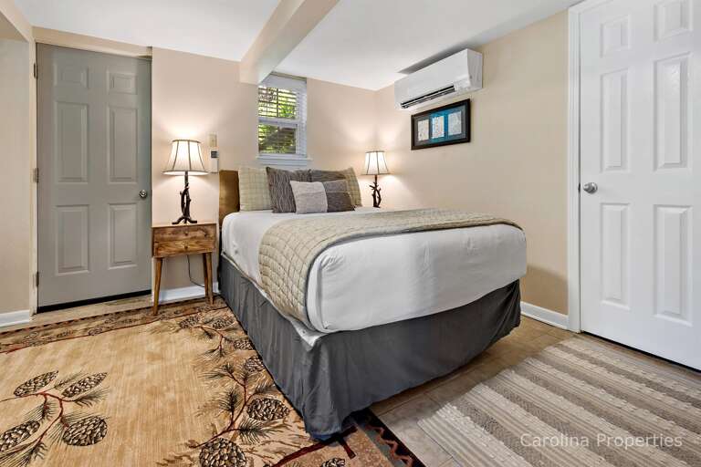 The downstairs bedroom with queen bed