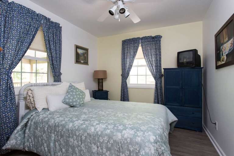 There is also a small wardrobe and TV in the room.