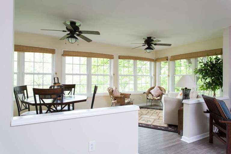 This is a beautiful home with wonderful finishes. The windows are perfect for a lakeside cottage. The ceiling fans and light fixtures are quality and tasteful.