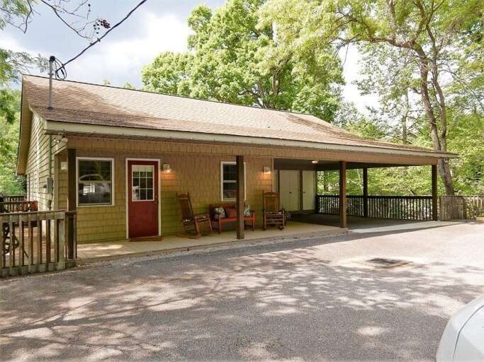 The exterior of the single-level home has a cottage feel with its singled front.