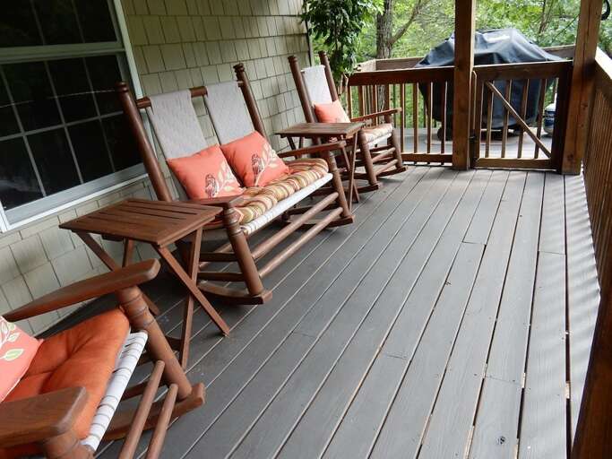 The covered porch outside the king bed suite is an amenity you will enjoy throughout your stay. The covered porch outside the king bed suite is an amenity you will enjoy throughout your stay.