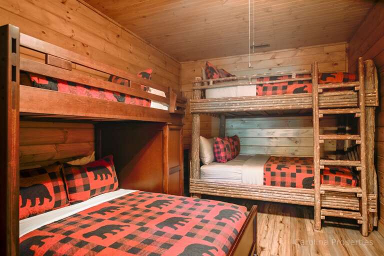 Lower level bunk room features twin, full, and two queen size beds Lower level bunk room features twin, full, and two queen size beds