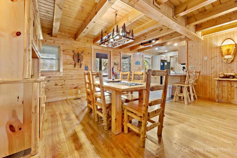 Additional view of kitchen bar and dining table