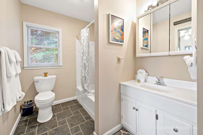 Upper level full bathroom with shower/tub combination Upper level full bathroom with shower/tub combination