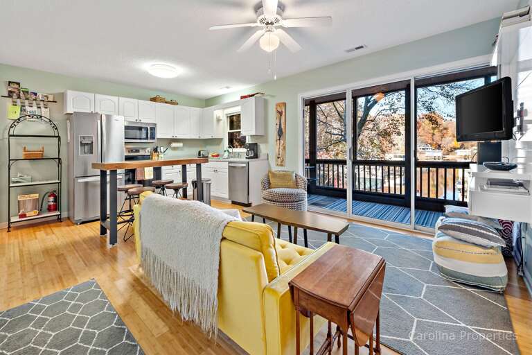 Cozy view of the living area and kitchen with views of Lake Lure Cozy view of the living area and kitchen with views of Lake Lure