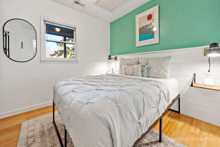 Upper-level bedroom with queen bed Upper-level bedroom with queen bed