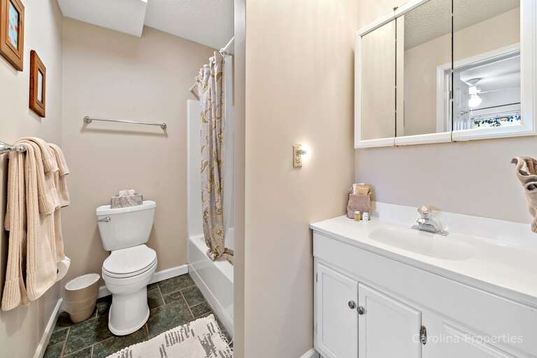 Lower level full bathroom with shower/tub combination Lower level full bathroom with shower/tub combination