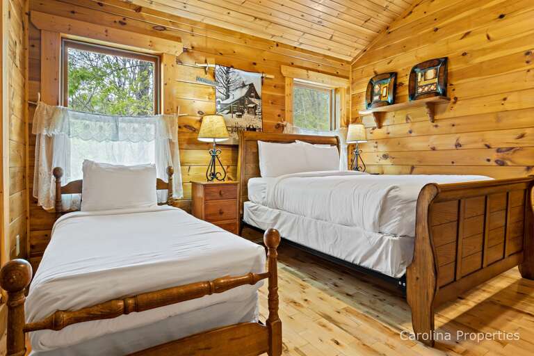 Second up stairs bedroom has two beds.