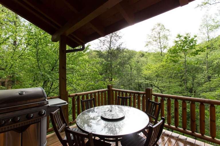 Step out to the deck is a gas grill and dining set that will seat 6. Step out to the deck is a gas grill and dining set that will seat 6.