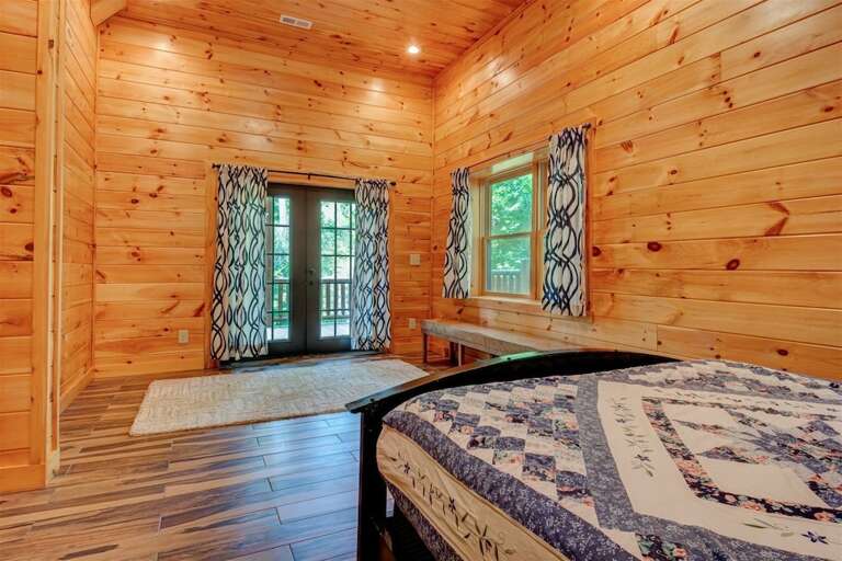 Lower level bedroom with queen bed Lower level bedroom with queen bed