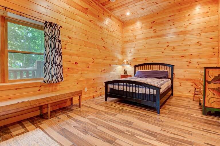 Lower level bedroom with queen bed Lower level bedroom with queen bed