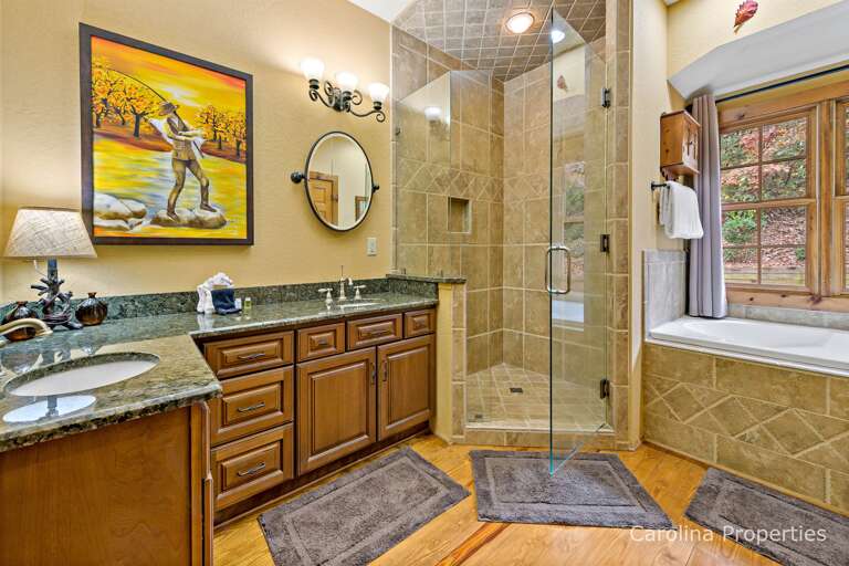 Main level master bathroom with walk-in shower and soaiking tub