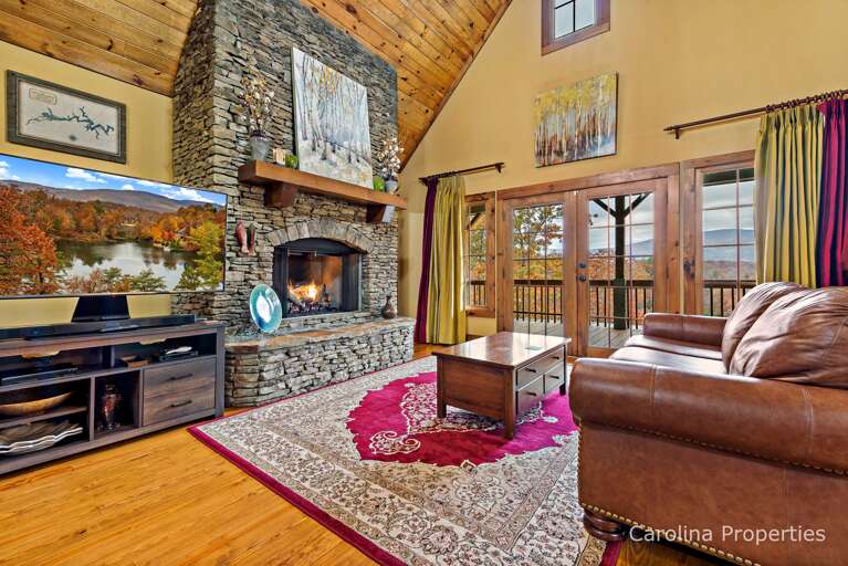 Walk into the cozy Livingroom with large stone, gas fireplace
