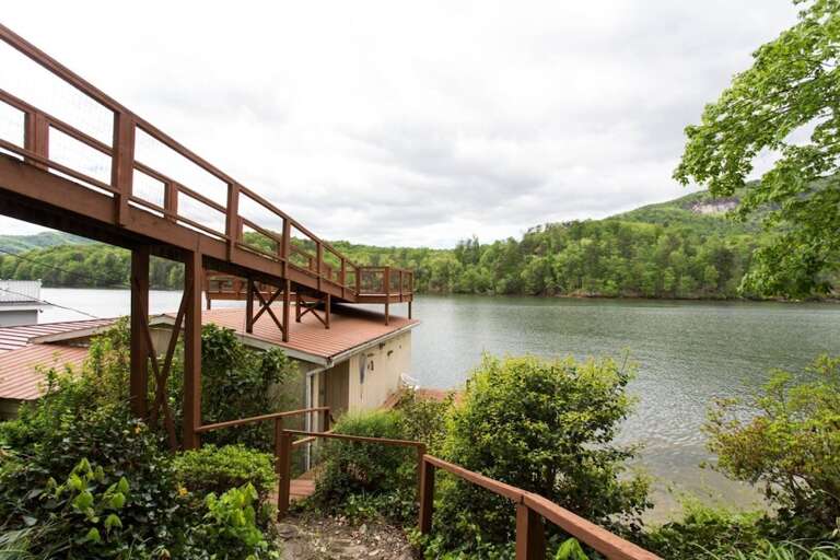 The ramp leads you back up to the lakeside deck of the home.