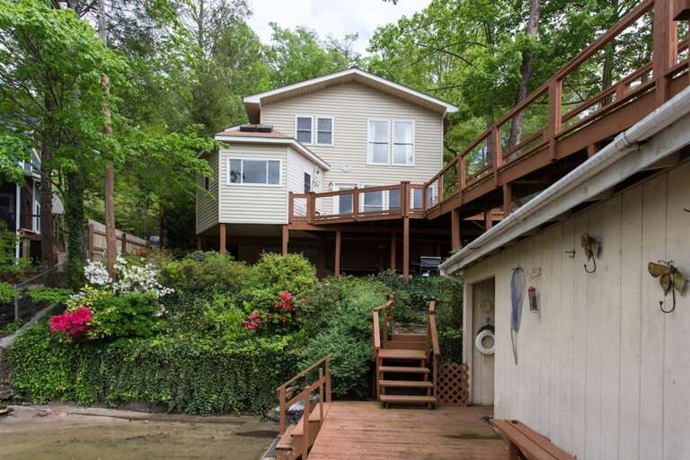 Steps from the home lead down to the boat house.