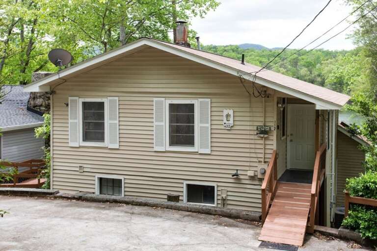 There is an entrance at the road with a ramp to the door. There is an entrance at the road with a ramp to the door.