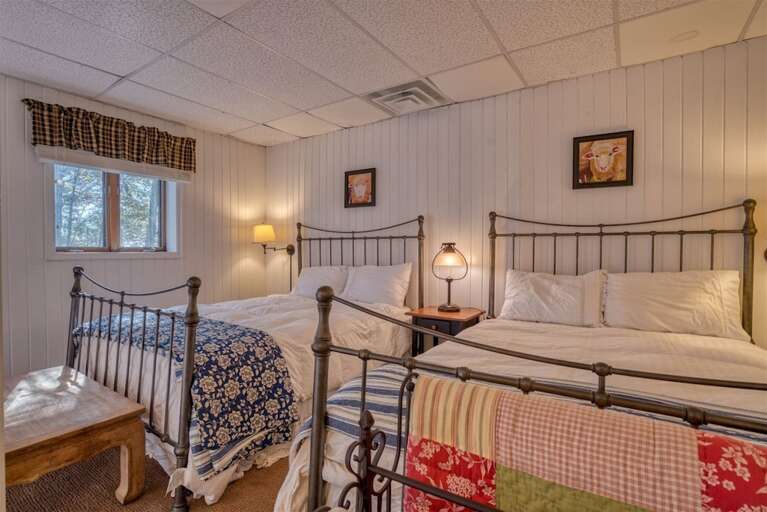 Lower level with two queen beds and a full bath