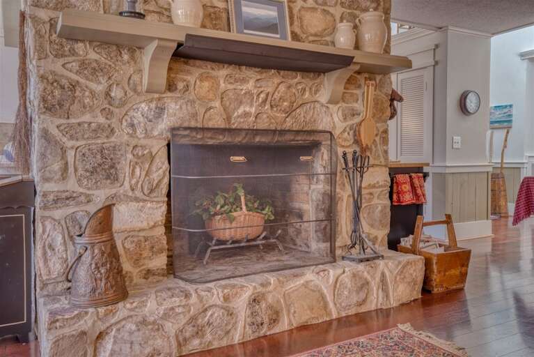 Handsome stone fireplace is non operational at this time