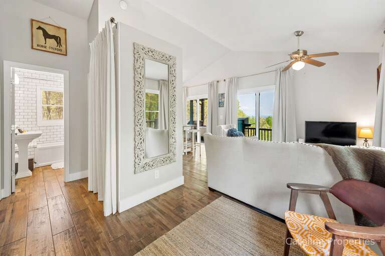 The bathroom is just off the living room