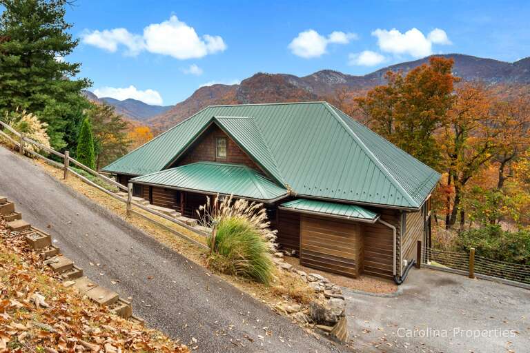 The driveway down to the home is steep