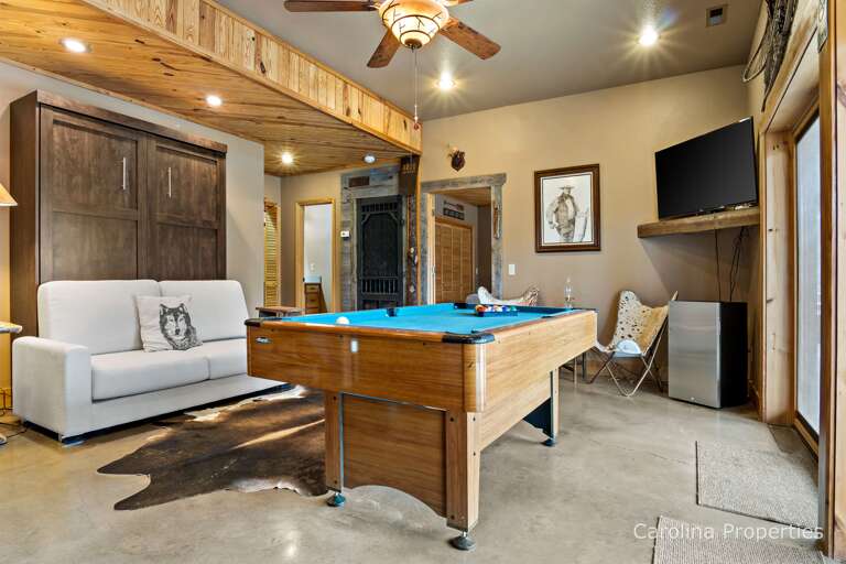 Lower level game room with queen size Murphey Bed