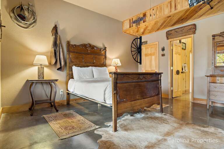 Lower level bedroom with queen bed