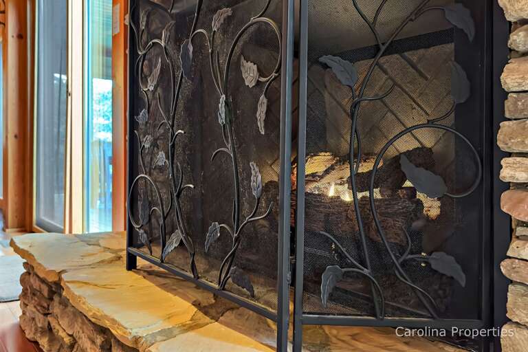 Beautiful stone fireplace with gas logs