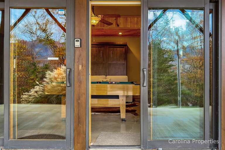 Doors leading to the lower patio area