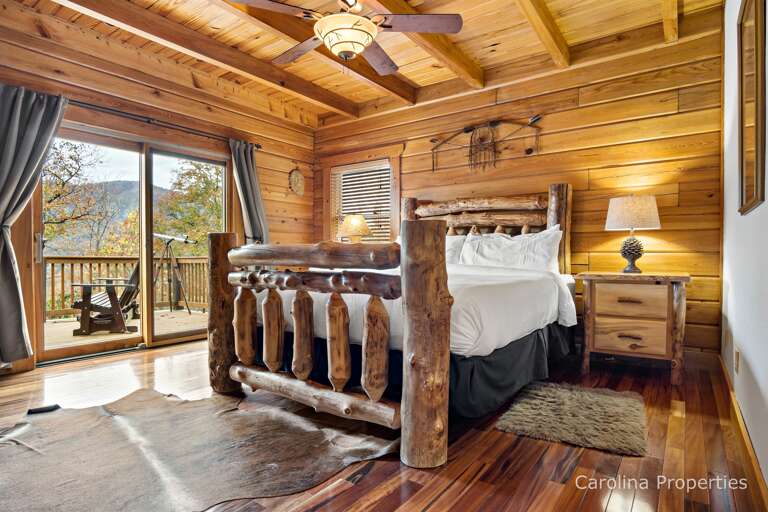 The sliding glass door in the main bedroom leads to the deck