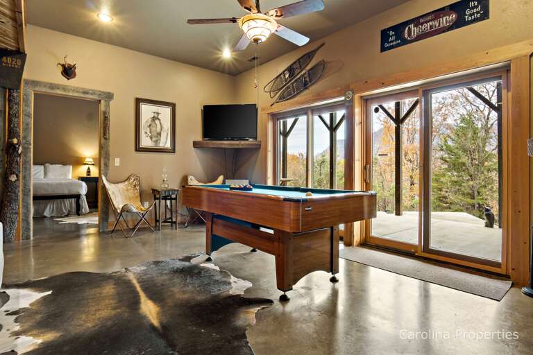 Sliding glass doors lead out to the lower patio area