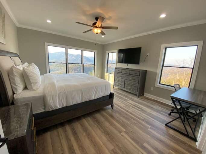 Upper level master bedroom with king bed