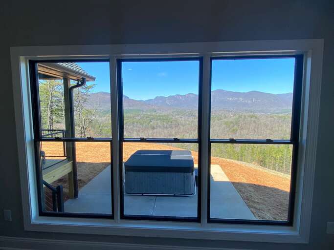 The home is surrounded with mountain views