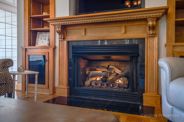 Beautiful fireplace with gas log Beautiful fireplace with gas log