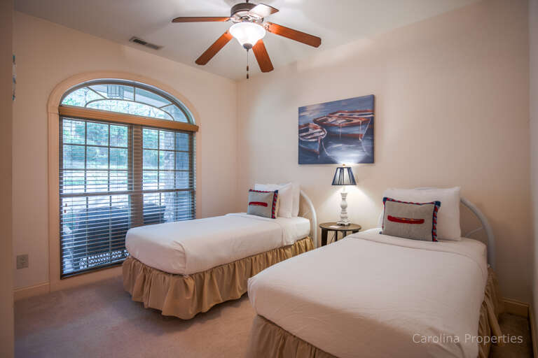 Main level bedroom 3 with two twin beds Main level bedroom 3 with two twin beds